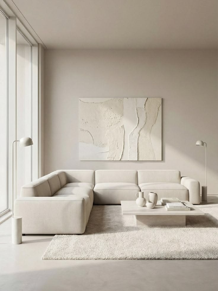 Living muito claro e iluminado com todos os elementos em cloud dancer e branco no tapete, sofa, p...